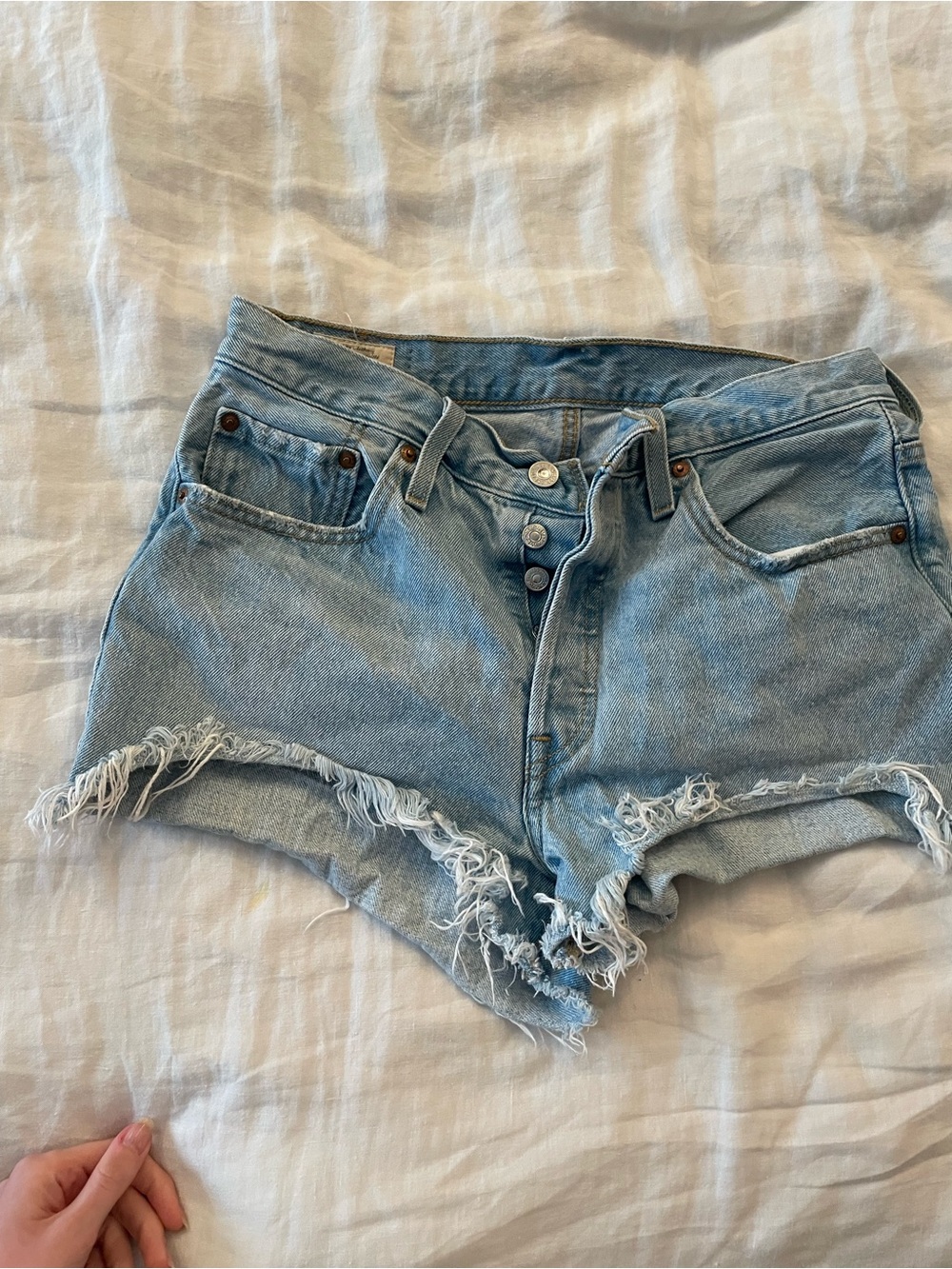 Levi’s Light Blue Distressed Denim Cutoff Shorts